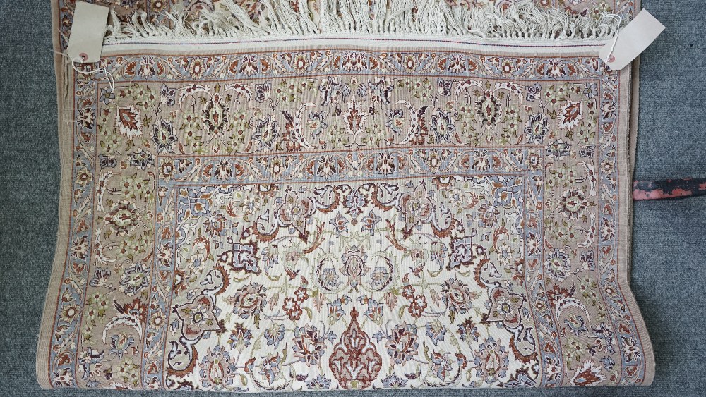 A fine part silk Esfahan rug, Persian, the ivory field with a brown shaped medallion, - Image 5 of 5