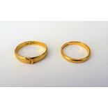 A 22ct gold plain wedding ring, Birmingham 1949, weight 2.