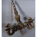 An Italian carved wooden five branch chandelier, 19th century, distressed grey with gilt traces,