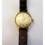 An Omega 9ct gold, circular cased Lady's wristwatch, with a signed jewlled movement,