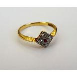 A gold and platinum, diamond and ruby set five stone square cluster ring,