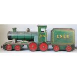 A scratch built wooden toy train, scale model, green painted, 'Flying Scotsman LNER 4472',