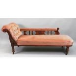 An Edwardian carved walnut frame chaise