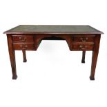 An early 20th century mahogany desk with
