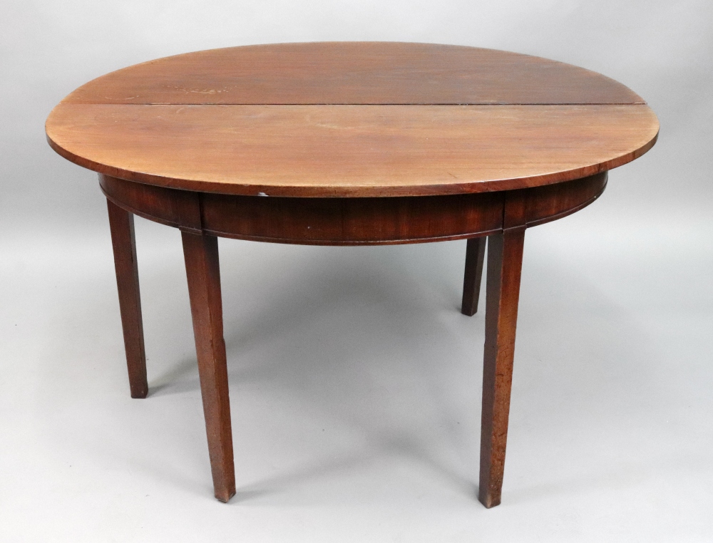 A George III mahogany dining table, with