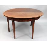 A George III mahogany dining table, with