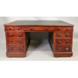 A Victorian mahogany kneehole desk, with
