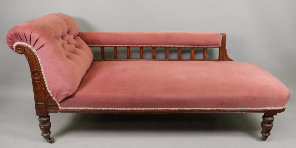 An Edwardian oak frame chaise longue, bu