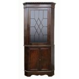 A George III mahogany floor standing cor