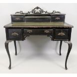 A Louis XV style foliate carved ebonised mahogany bonheur de jour, late 19th century,