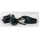 A Leica R4 camera, with a Leica Vario -