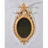 A George III gilt framed mirror with pierced acanthus crest,