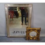 A Regency style gilt framed wall mirror with oval bevelled plate,