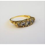 An 18ct gold and diamond five stone ring,