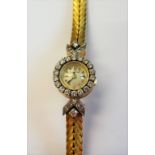 A Jaeger-le Coultre gold and diamond set rear winding lady's bracelet wristwatch,