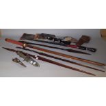 Collectables, including; tribal spears, a wooden training katana,