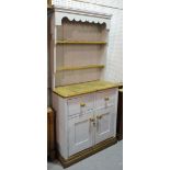 An early 20th century blue painted pine dresser with two tier plate rack on plinth base,