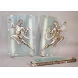A pair of Art Deco silvered metal and frosted glass wall lights, in the manner of Pierre Le Faguays,