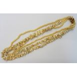 A triple strand cultured and freshwater blister pearl long necklace,