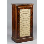 An early Victorian gilt-metal mounted coromandel side cabinet,