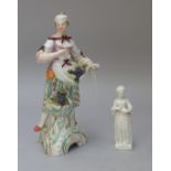 A Berlin porcelain figure of a young woman, 19th century, possibly representing Autumn,