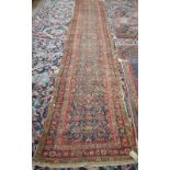 A Fereghan runner, Persian, the indigo field with an all over herate design,