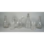 A group of glassware, 19th century, comprising; a pair of moulded triple-ring neck decanters, 22.