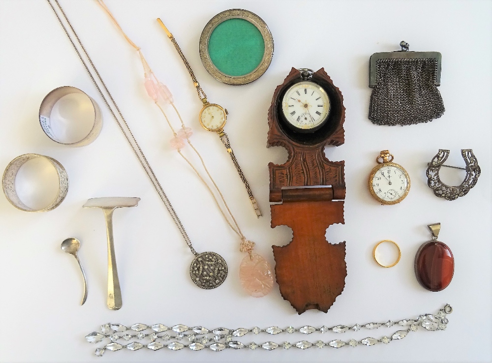 A Zenith 9ct gold circular cased lady's wristwatch, Birmingham 1933, on a gold cord bracelet,