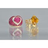 A ruby and diamond set dress ring of bombe heart design,