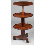 A William IV metamorphic mahogany circular three tier dumb waiter on triangular platform,