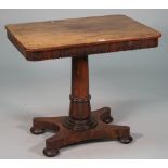 A Regency rosewood games table, the detachable rectangular top revealing a games board interior,