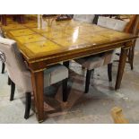 A 20th century stained beech extending dining table with parcel gilt decoration on tapering square