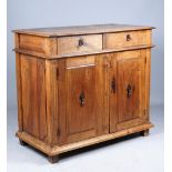 A 17th century and later Italian walnut commode with pair of drawers over pair of cupboards,