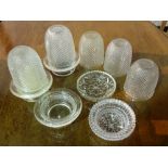 A large quantity of modern moulded glass candle and tea light holders, (qty).