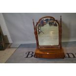 A Victorian mahogany swing frame toilet mirror with three drawer base, 61cm wide x 85cm high.
