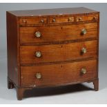 A Regency crossbanded mahogany bowfront chest of three short over three long graduated drawers on