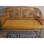 A 20th century aesthetic style bamboo bench and pair of armchairs, (3).
