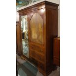 A Victorian walnut double wardrobe with arched mirrored door, 154cm wide x 195cm high.