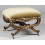 A 19th century Italian gilt-metal mounted walnut foot stool,
