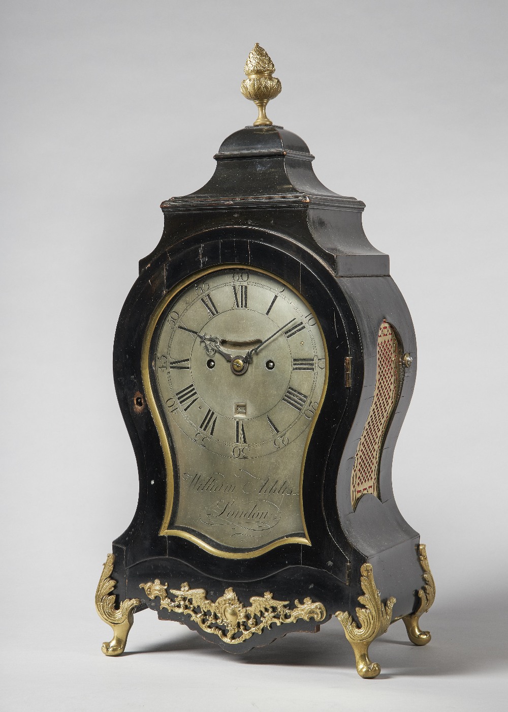 A George III giltmetal-mounted ebonised striking balloon clock By William Addis,