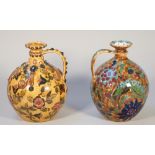 A Zsolnay Pecs ewer, early 20th century, decorated with flowers against a mottled buff ground,