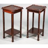 A pair of mid-18th century style mahogany square two tier occasional tables with out stepped