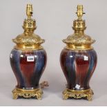 A pair of Chinese style porcelain table lamps, 20th century,