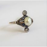 A diamond, natural salt water pearl and blue gem set ring,