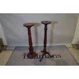 A Regency style mahogany jardinière stand on a fluted column plinth base,