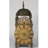 A William III brass lantern clock Signed John Clowes, London,