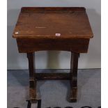 An early 20th century stained pine child's school desk,