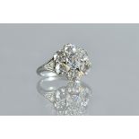 A diamond set seven stone cluster ring,