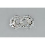A white precious metal and diamond set double clip/brooch, of figure of eight design,
