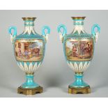 A pair of Sevres-style gilt-metal mounted two-handled vases, 19th century,